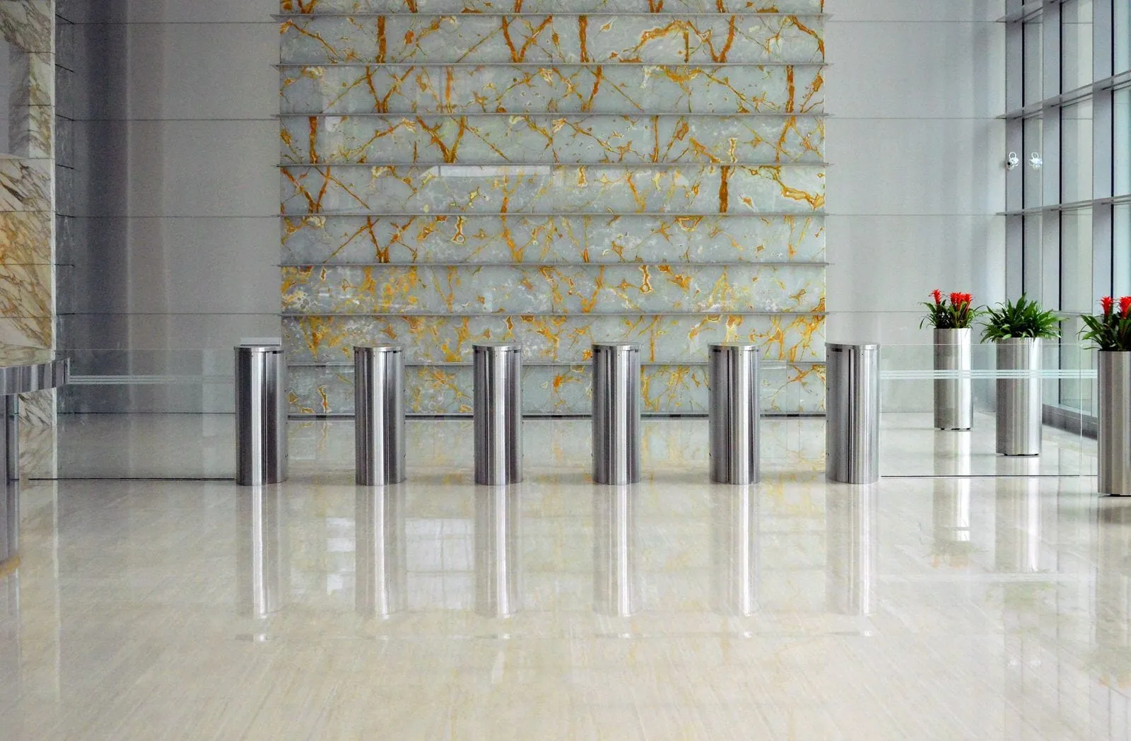 Commercial building lobby with marble floors and glass doors in Central Florida
