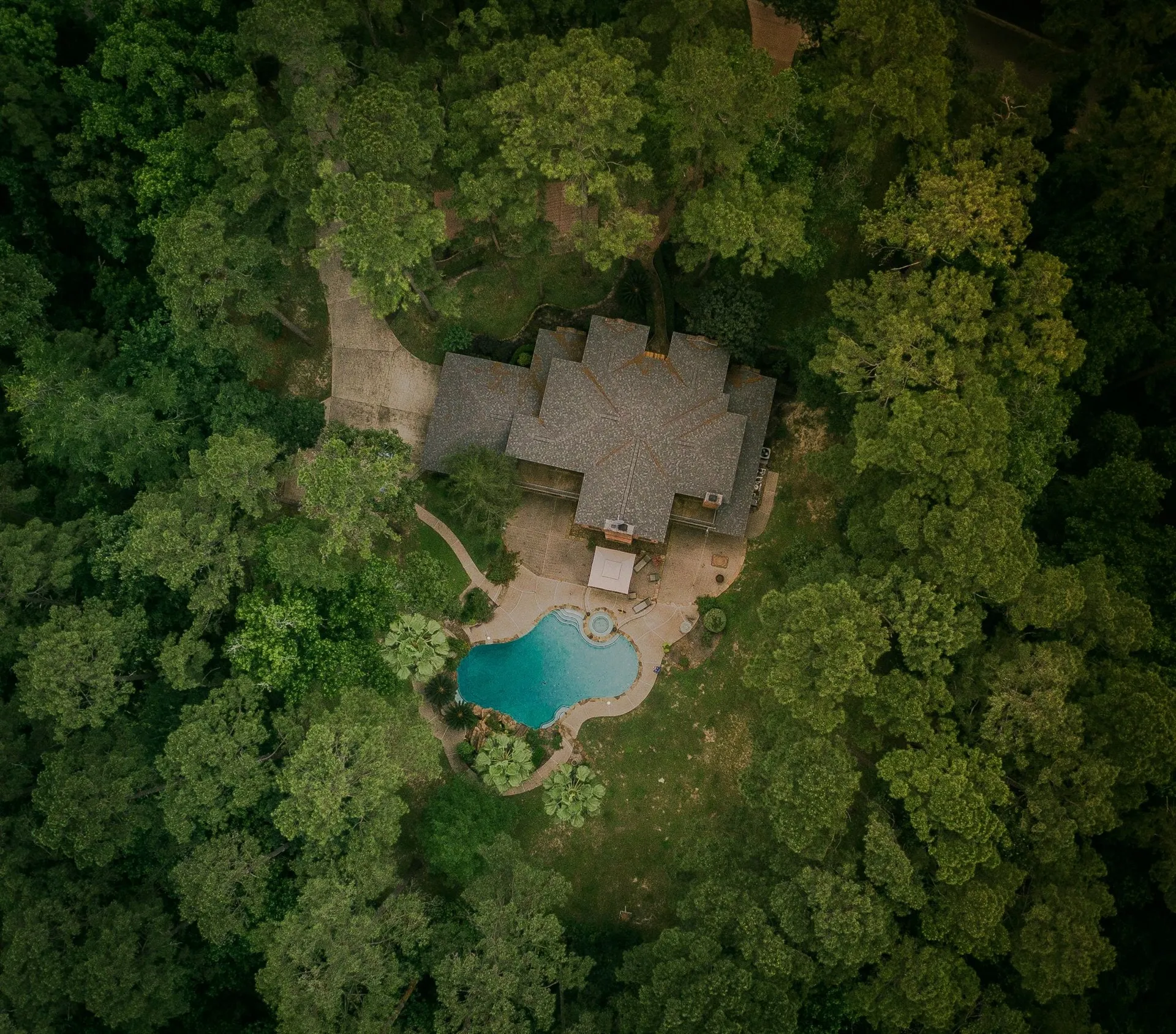 Aerial listing photography of homes among mature trees and green space in Fruitland Park FL